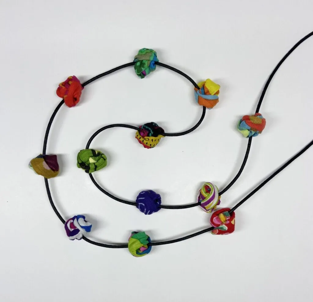 FICKLESTICKS Small Gumball Slider - BLACK WITH NEON CORD (NOT MULTI)