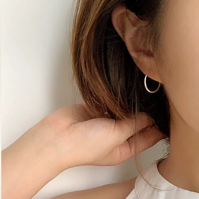LOVCIA Sleek Mini Circle 925 Sterling Silver Rhodium-Plated Hoop Earrings for Women