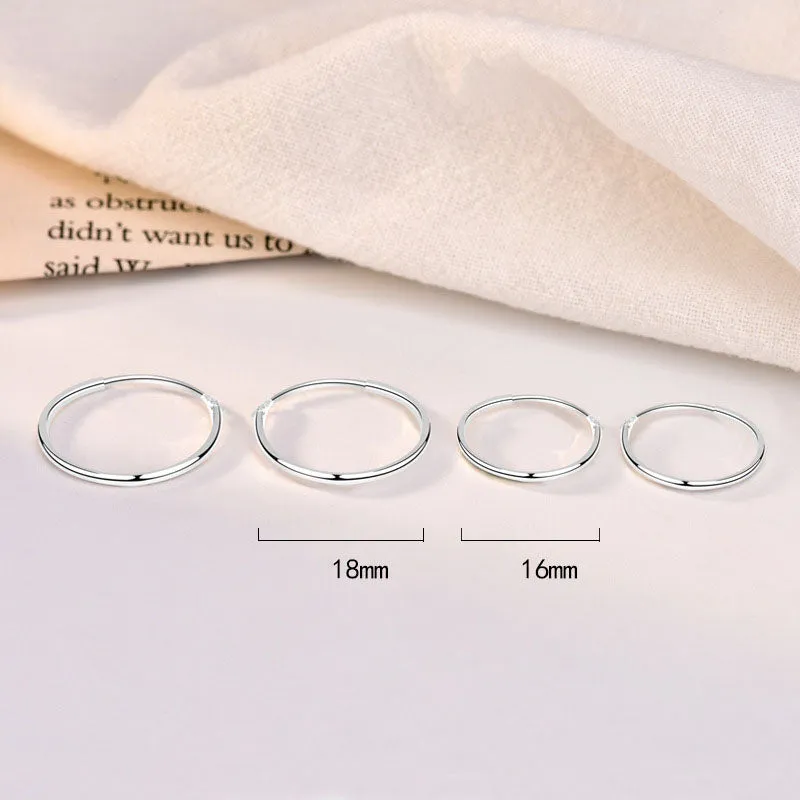 LOVCIA Sleek Mini Circle 925 Sterling Silver Rhodium-Plated Hoop Earrings for Women