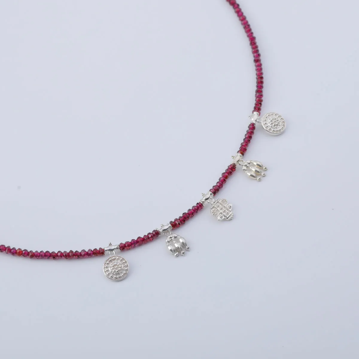 Mini Saaj Motifs Necklace with Garnet