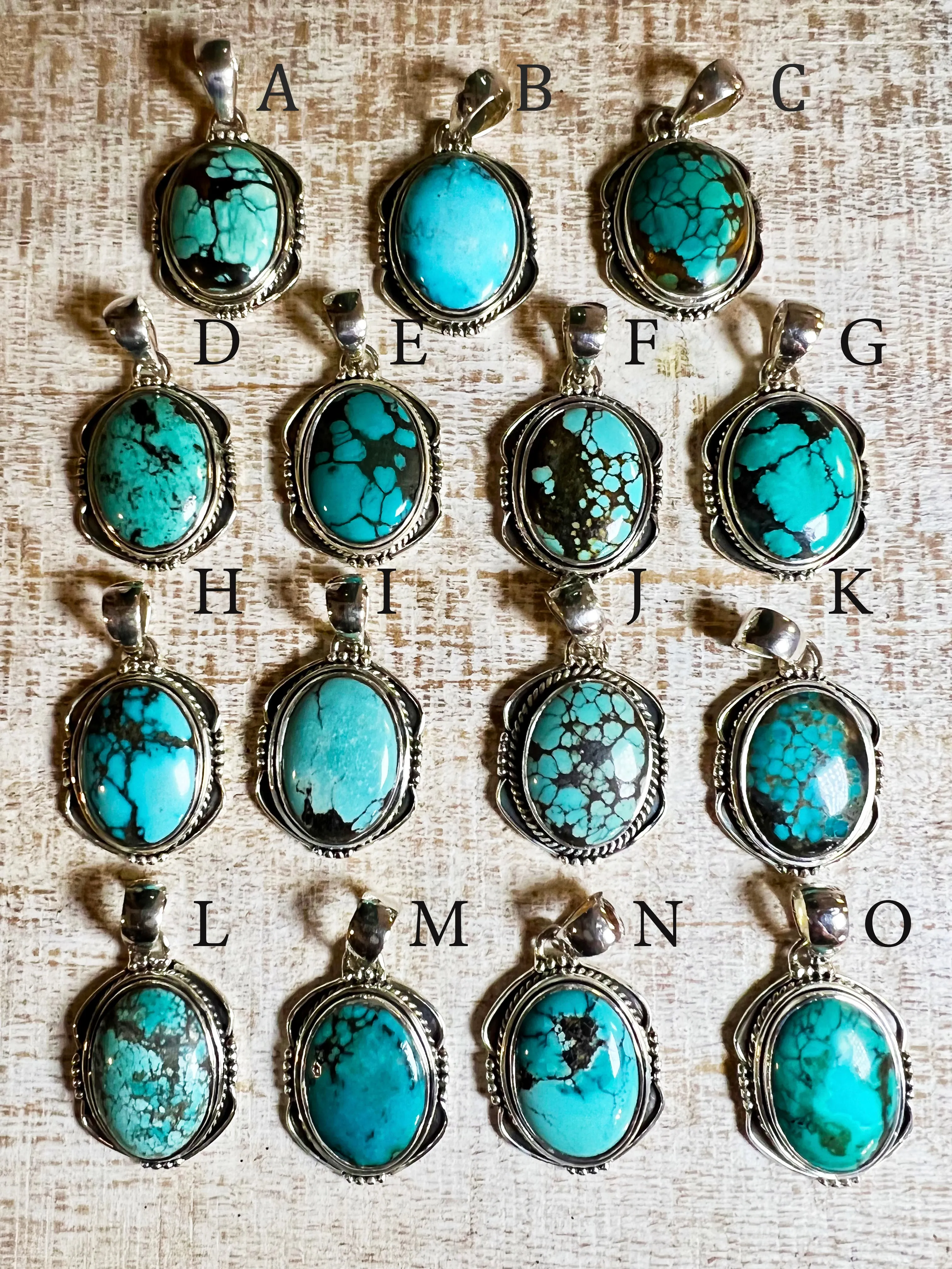 Natural Turquoise Pendant with an Oval Shield Setting