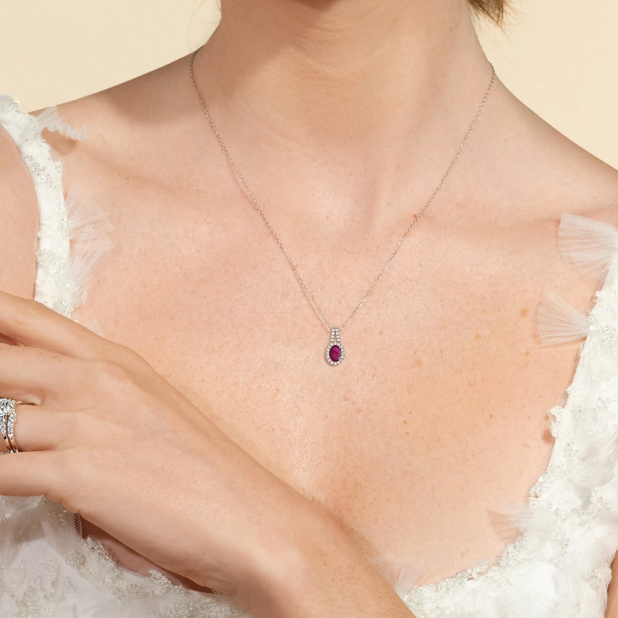 Oval Ruby and Lab Diamond Classic Halo Pendant With Studded Split Bale