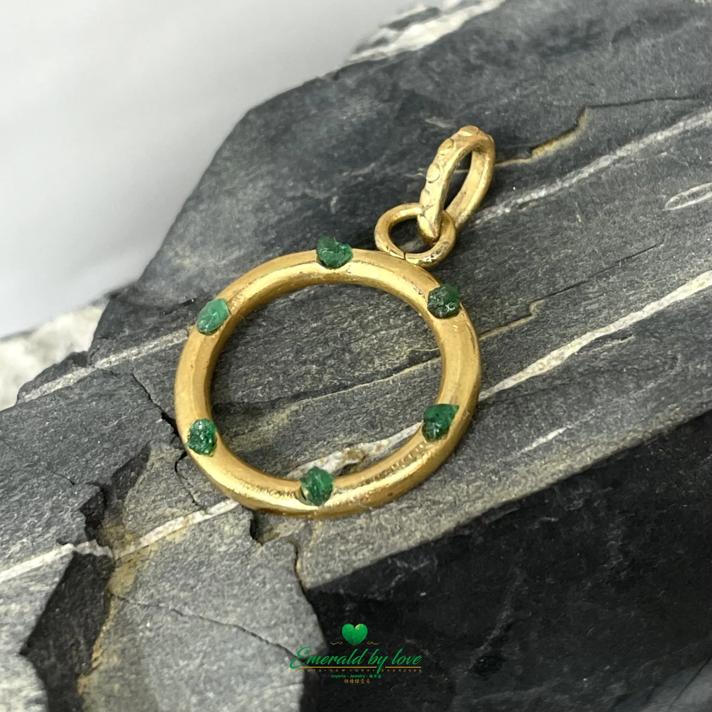 Refined Hoop Pendant with Small Inlaid Rough-Cut Emeralds
