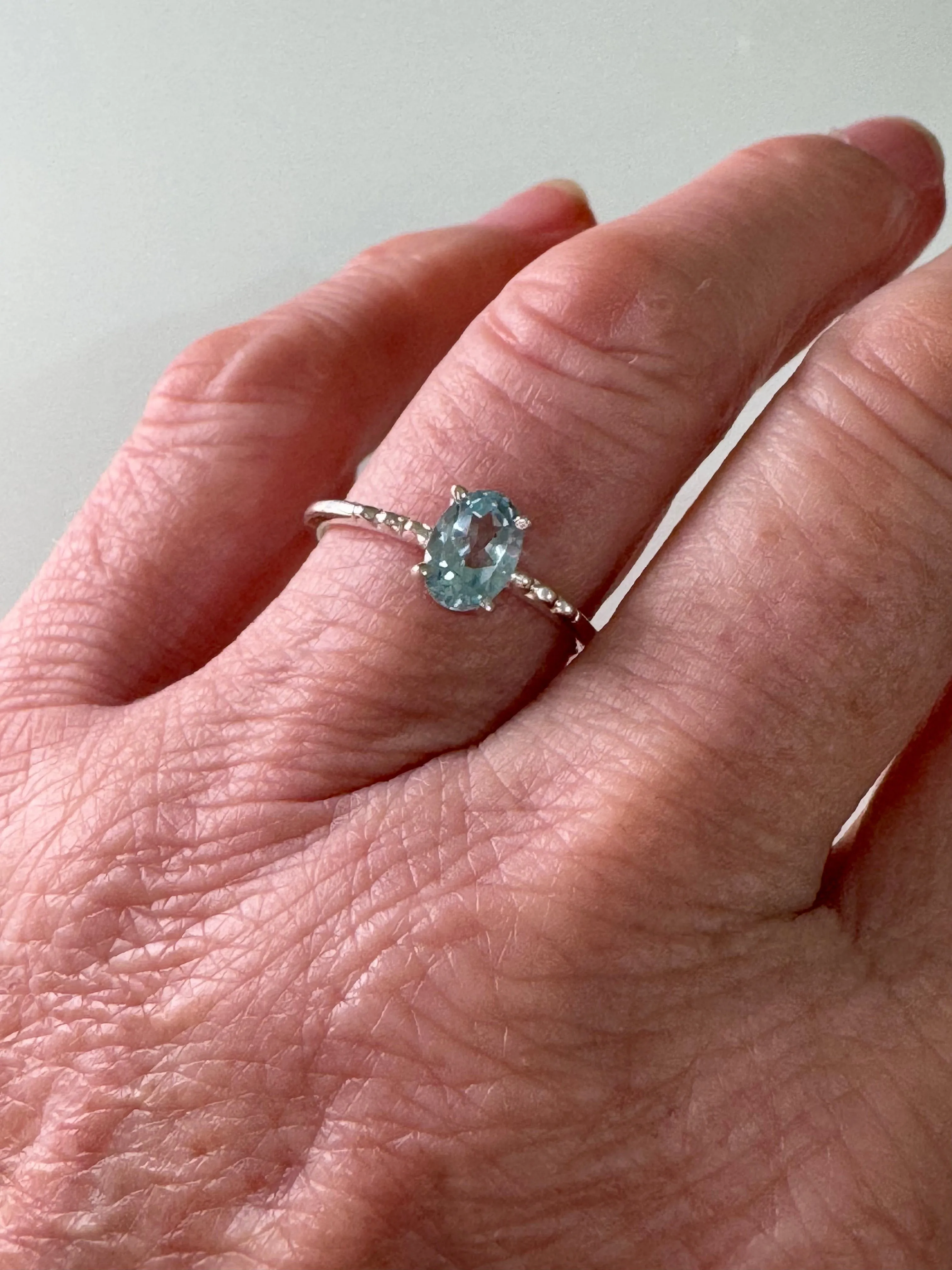 Sleek Blue Topaz Ring