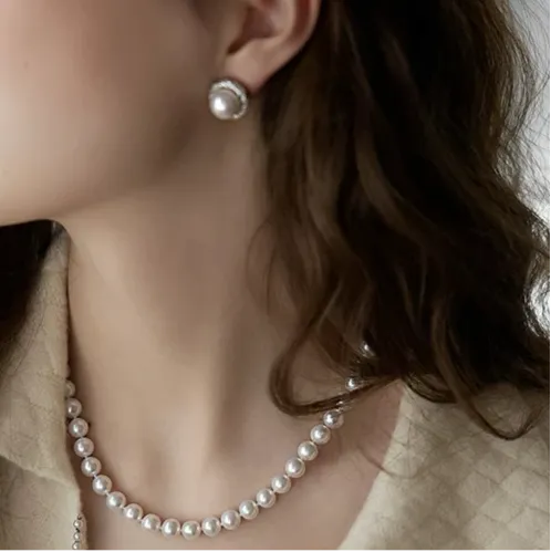 Timeless Pearl Crystal Swirl Stud Earrings -Lustrous and Radiant